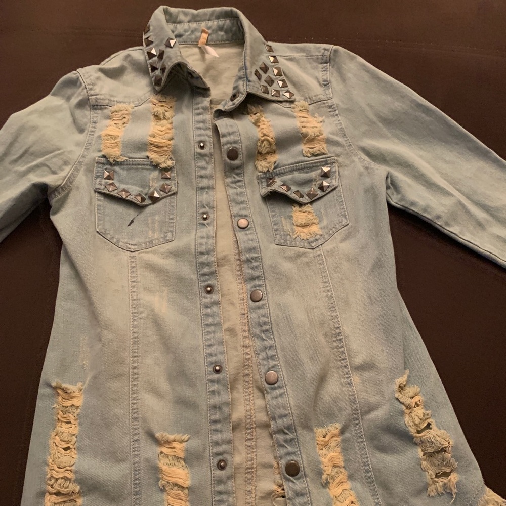 Distressed studded jacket , minimal use